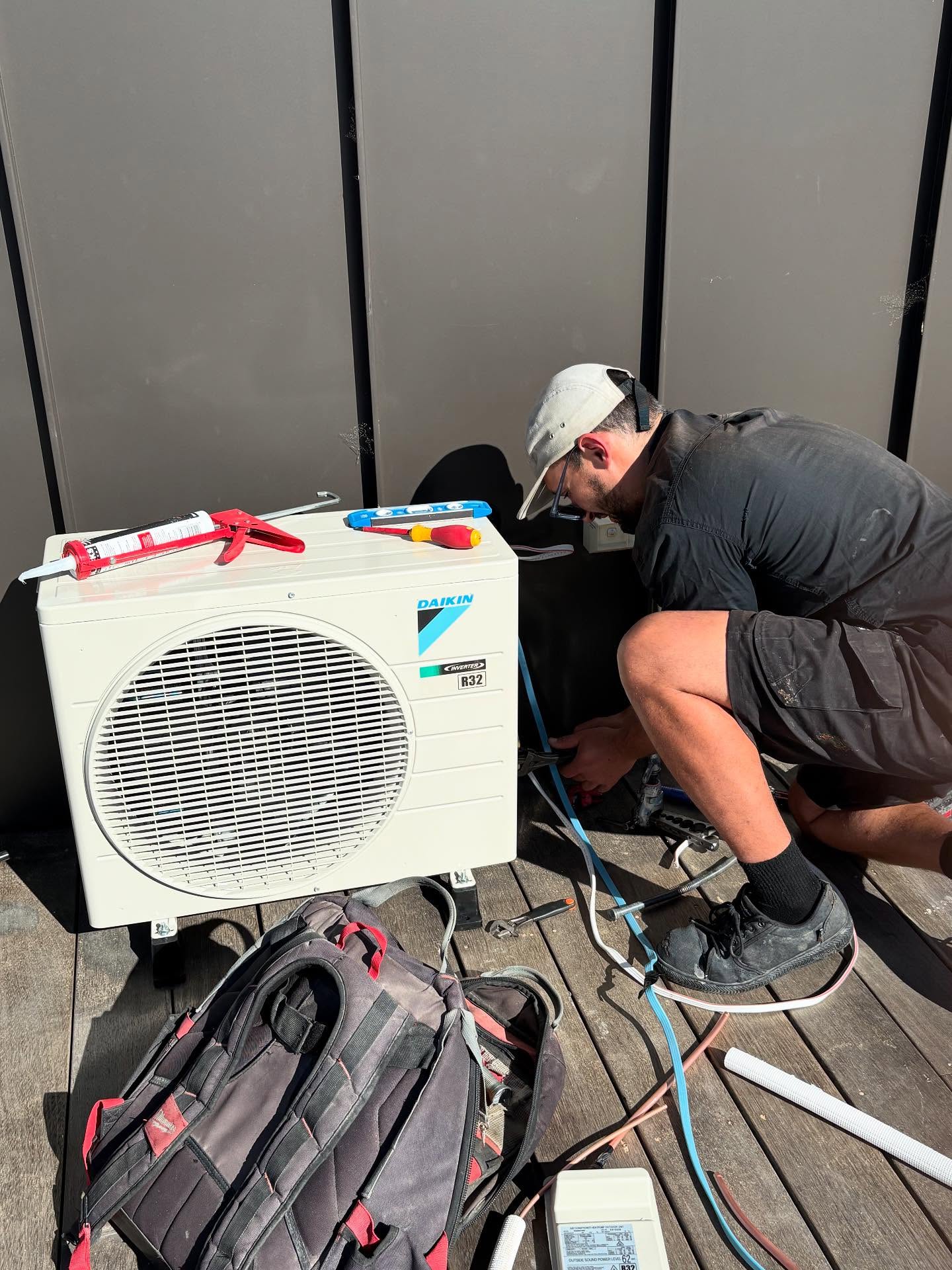 Shak installing a Daikin Inverter R32 outdoor unit